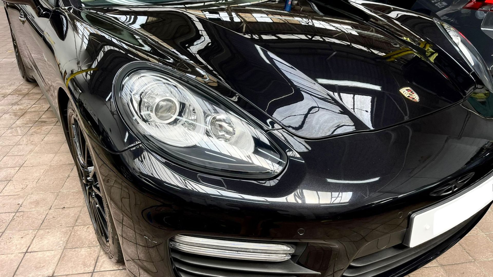 Detailed black Porsche Panamera front end